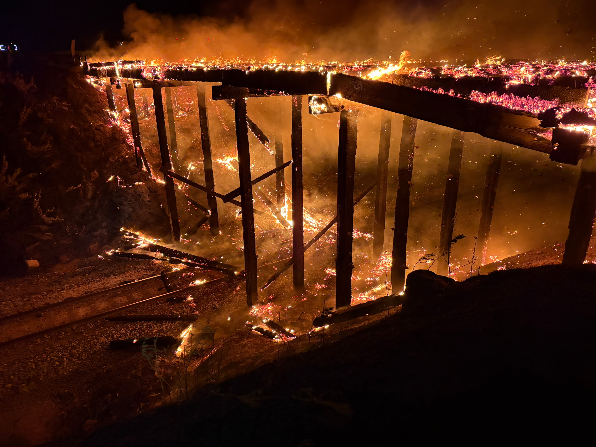 Fire engulfs bridge near Max
