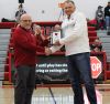 Outgoing Washburn Superintendent Brad Rinas presented with The Cardinal Award