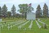 Flag flies with honor over veterans’ white crosses